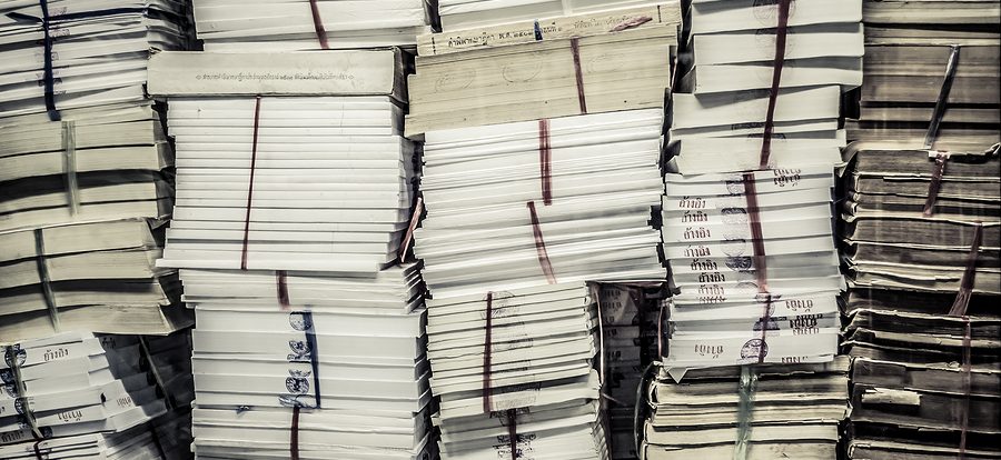 Stacks of Archived Documents Ready to be Shredded