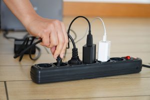 Woman unplugged plug to save on energy